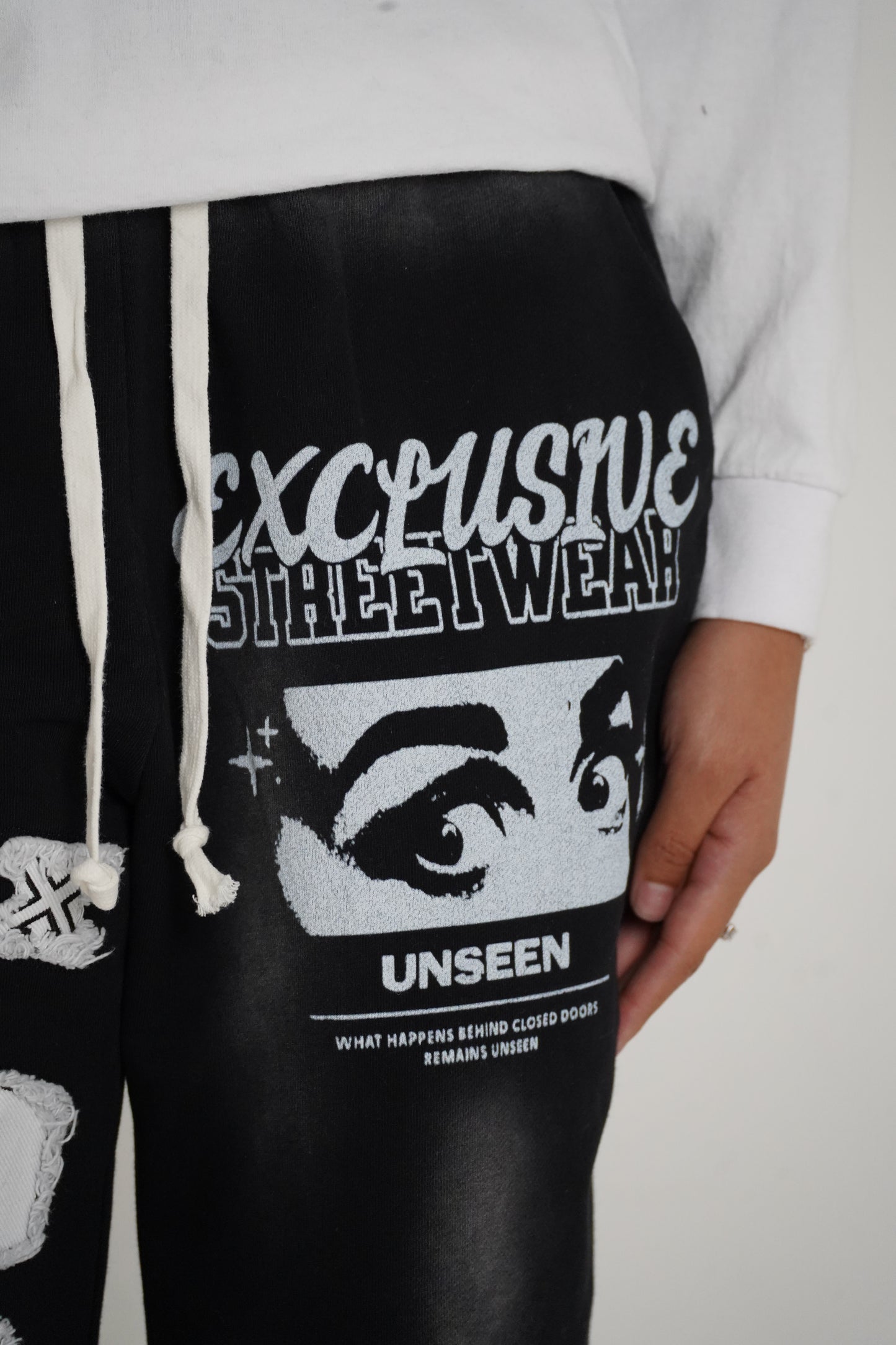 Black Unseen Flared Sweatpants